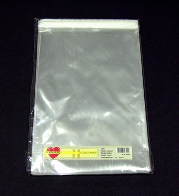 64009 - Plastic bags with adhesive strip.